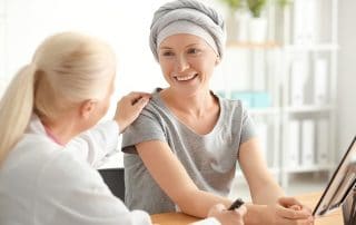 Woman after chemotherapy visit with a doctor after treatment. Cancers that women are prone to might respond more to oxygen shortage, like in sleep apnea.